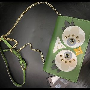 Owl clutch with chain strap.